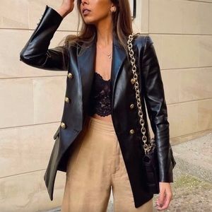 Versatile Faux leather blazer.
